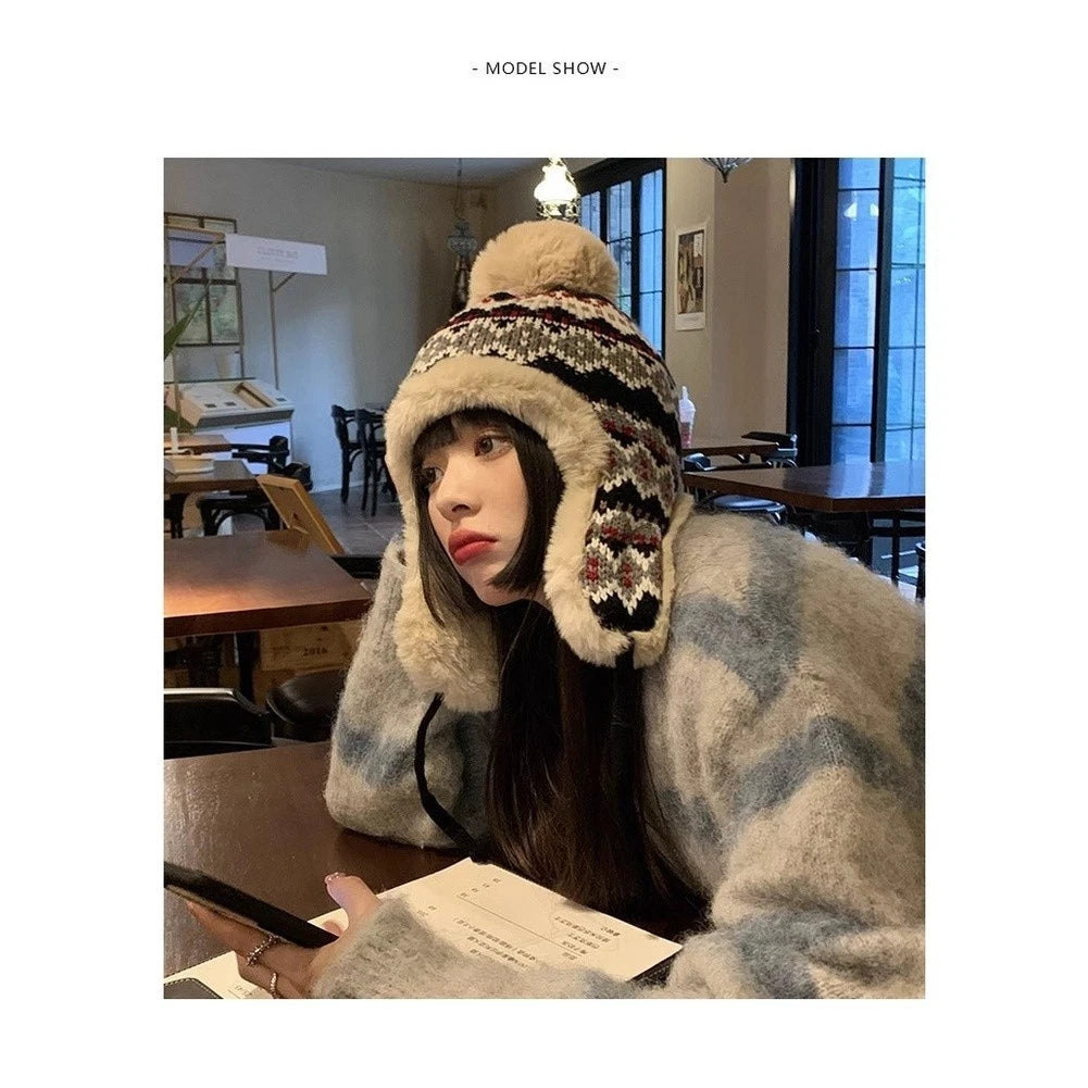 Cozy knit beanie with fleece ear flaps for cold weather