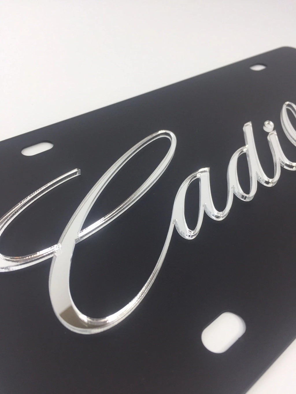 Cadillac Script Emblem Black License Plate Frame with Mirror (Made in USA)