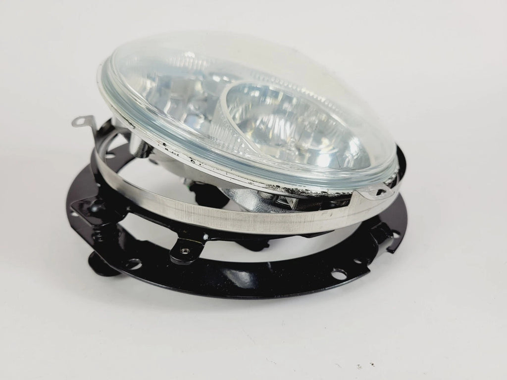 7" Dual Lamp Headlight for Harley Touring (2009–2022) - OEM, w/ Bracket