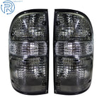 Set of 2 Smoke Tail Lights for Toyota Tacoma (2001–2004)
