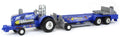 ERTL 1/64 New Holland Fast Forward Pulling Tractor with Sled 47574