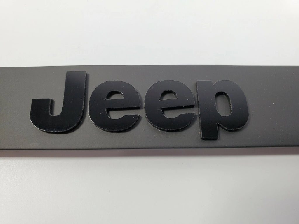 Matte Black Premium License Plate Frame with Script Emblem for Jeep (2007–2025)