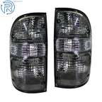 Set of 2 Smoke Tail Lights for Toyota Tacoma (2001–2004)