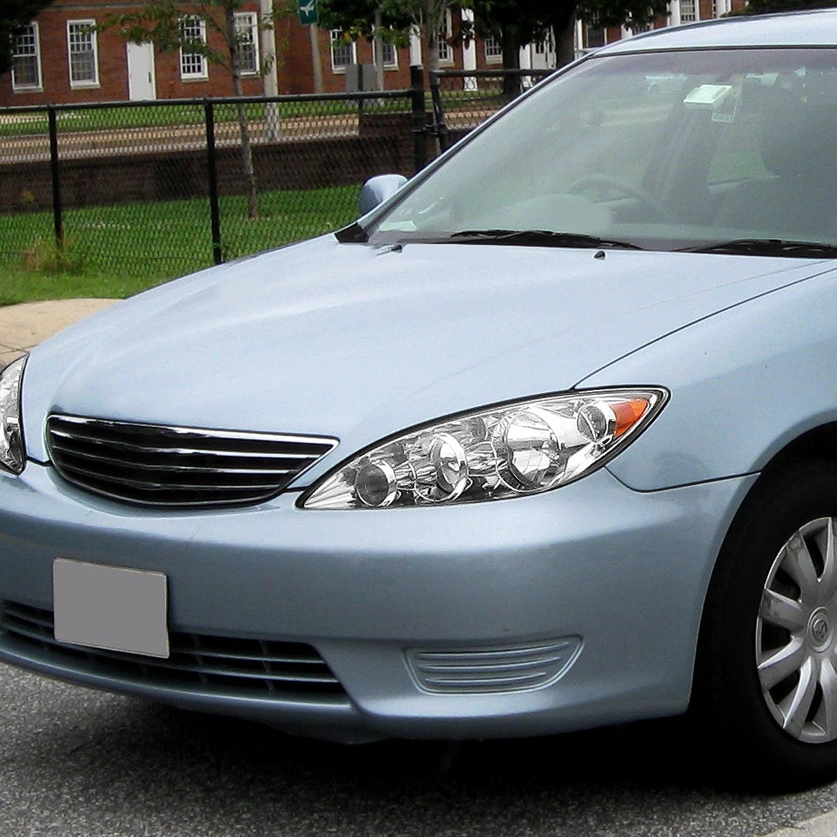 Left Driver Side Headlight for Toyota Camry (2005–2006)