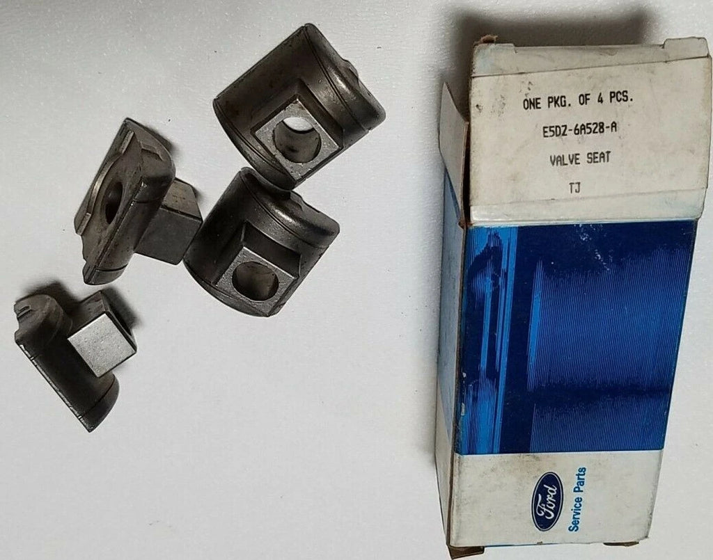 Set of 4 NOS OEM Valve Seats for Ford Mercury (1982–1999) E5DZ-6A528-A