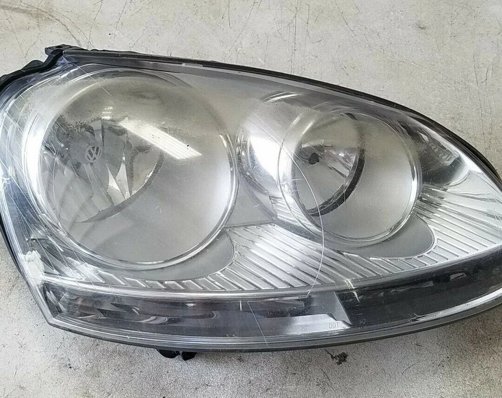 Halogen Headlamp for Volkswagen Jetta Rabbit (2005) OEM Hella 1K6941006S
