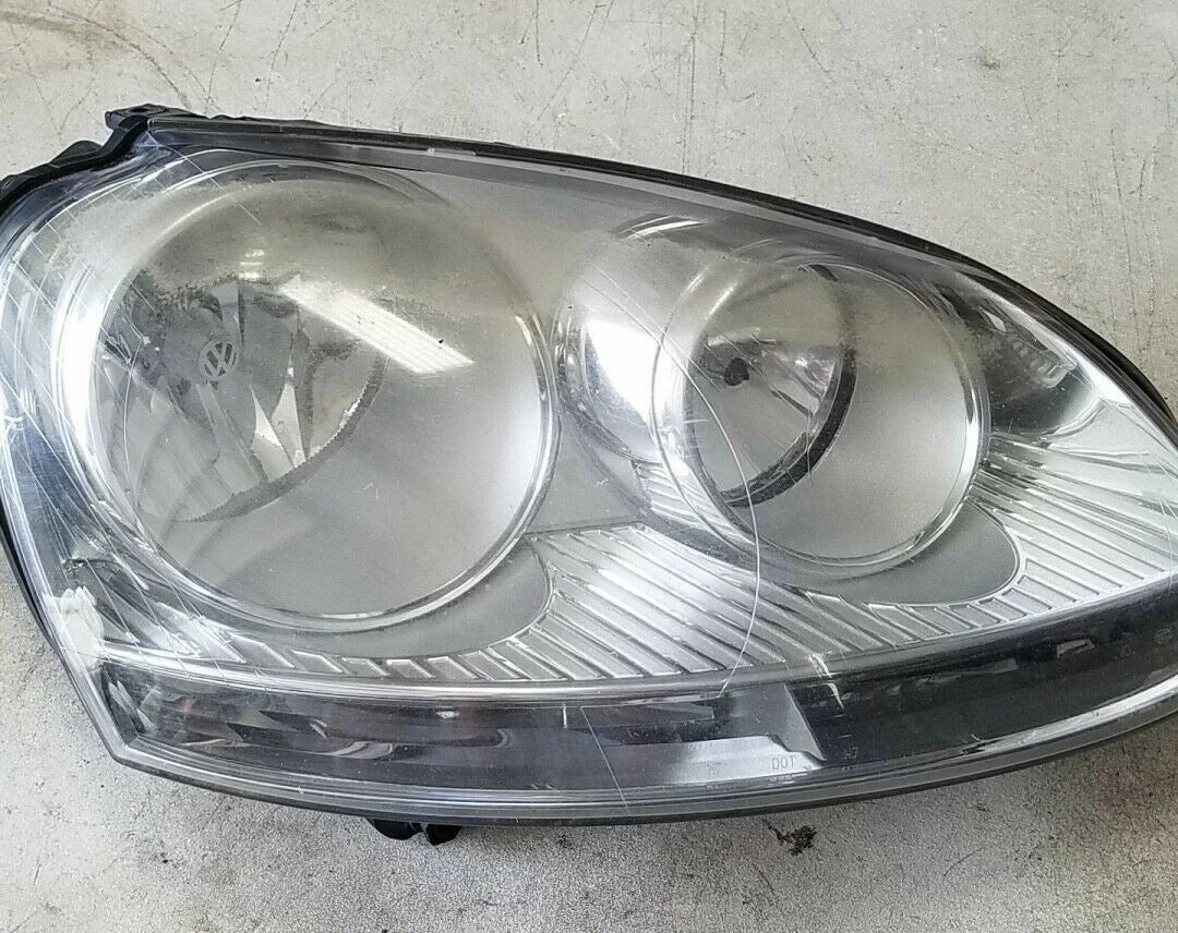 Halogen Headlamp for Volkswagen Jetta Rabbit (2005) OEM Hella 1K6941006S