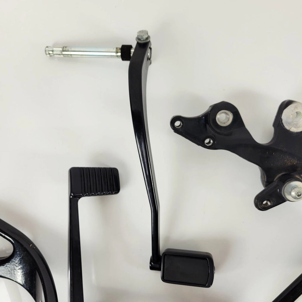 Set of 2 OEM Mid Control Black Willie G Pegs for Harley Softail Street Bob (2018–2023)