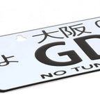 NRG Innovations Mini License Plate for Osaka (00) MP-001-GDB