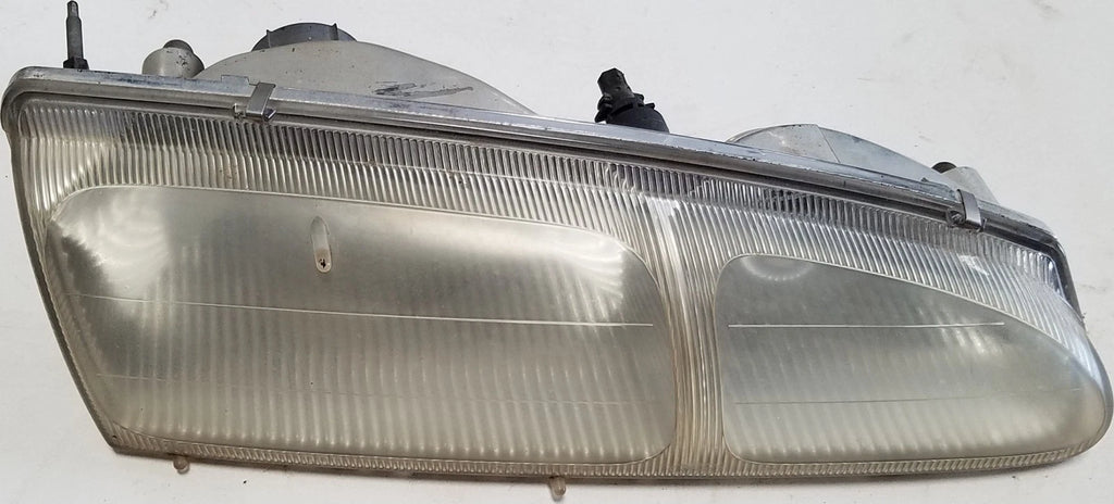 Headlight Passenger Side for Ford Thunderbird Cougar (1996–1997) OEM