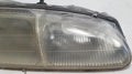 Headlight Passenger Side for Ford Thunderbird Cougar (1996–1997) OEM