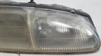 Headlight Passenger Side for Ford Thunderbird Cougar (1996–1997) OEM