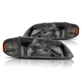 Direct Replacement Headlight for Mazda 626 (1998–1999) Smoked Housing Amber Side