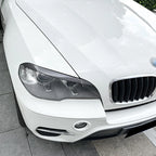 Pair Add-On Headlight Eye Lids for BMW X5 E70 (2008–2013) Carbon Fiber Look
