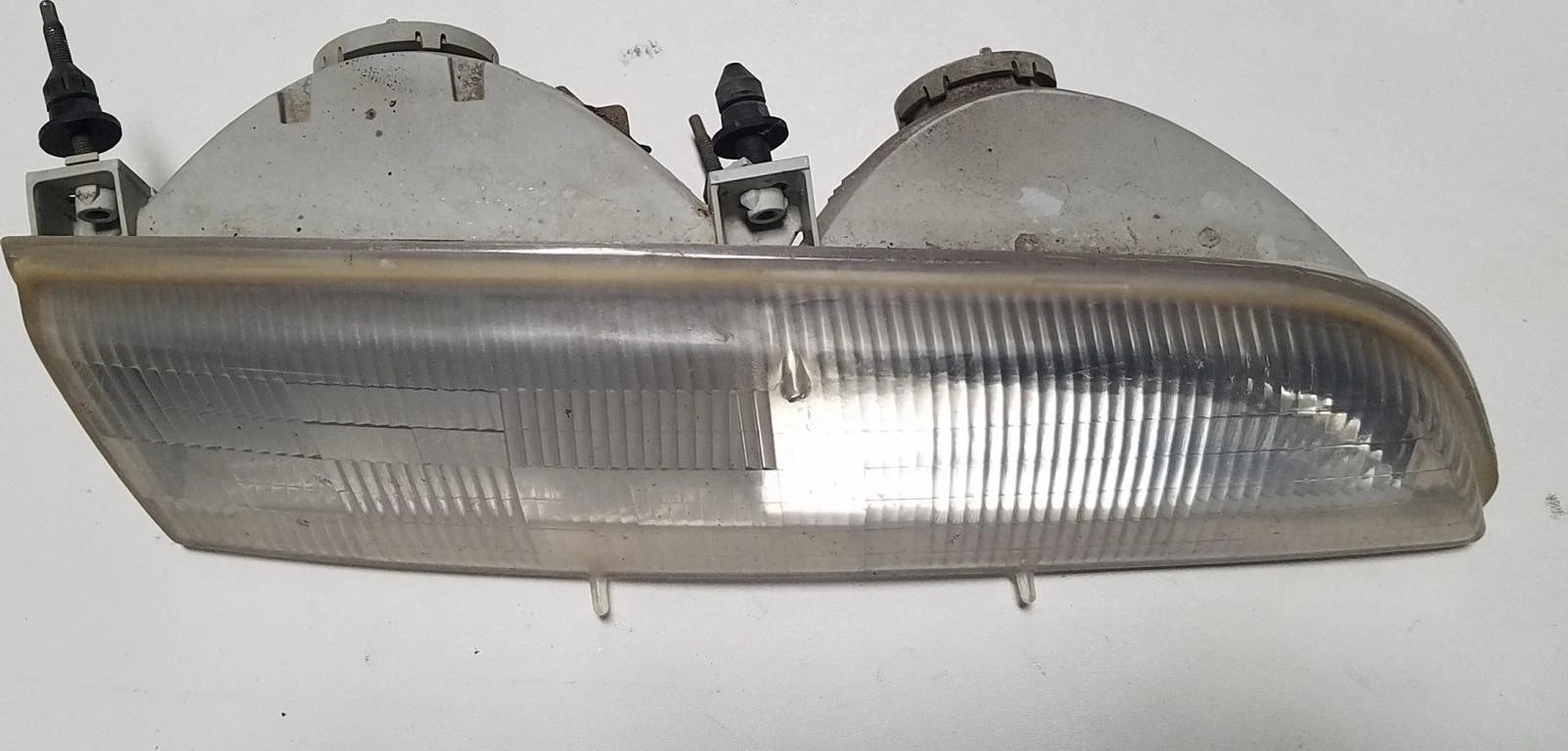 Headlight for Ford Thunderbird (1989–1993) Passenger Side Grade B