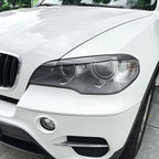 Pair Add-On Headlight Eye Lids for BMW X5 E70 (2008–2013) Carbon Fiber Look