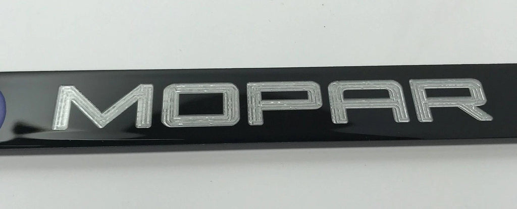 License Plate Frame Black Metal with Blue MOPAR Script for Dodge (2011–2024)