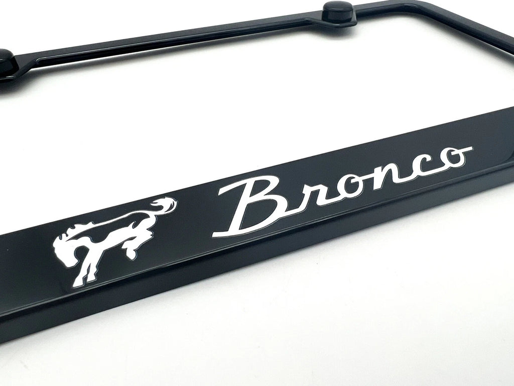 License Plate Frame w/ White Vintage Ford Bronco Script Emblem for Bronco (1966–1977)