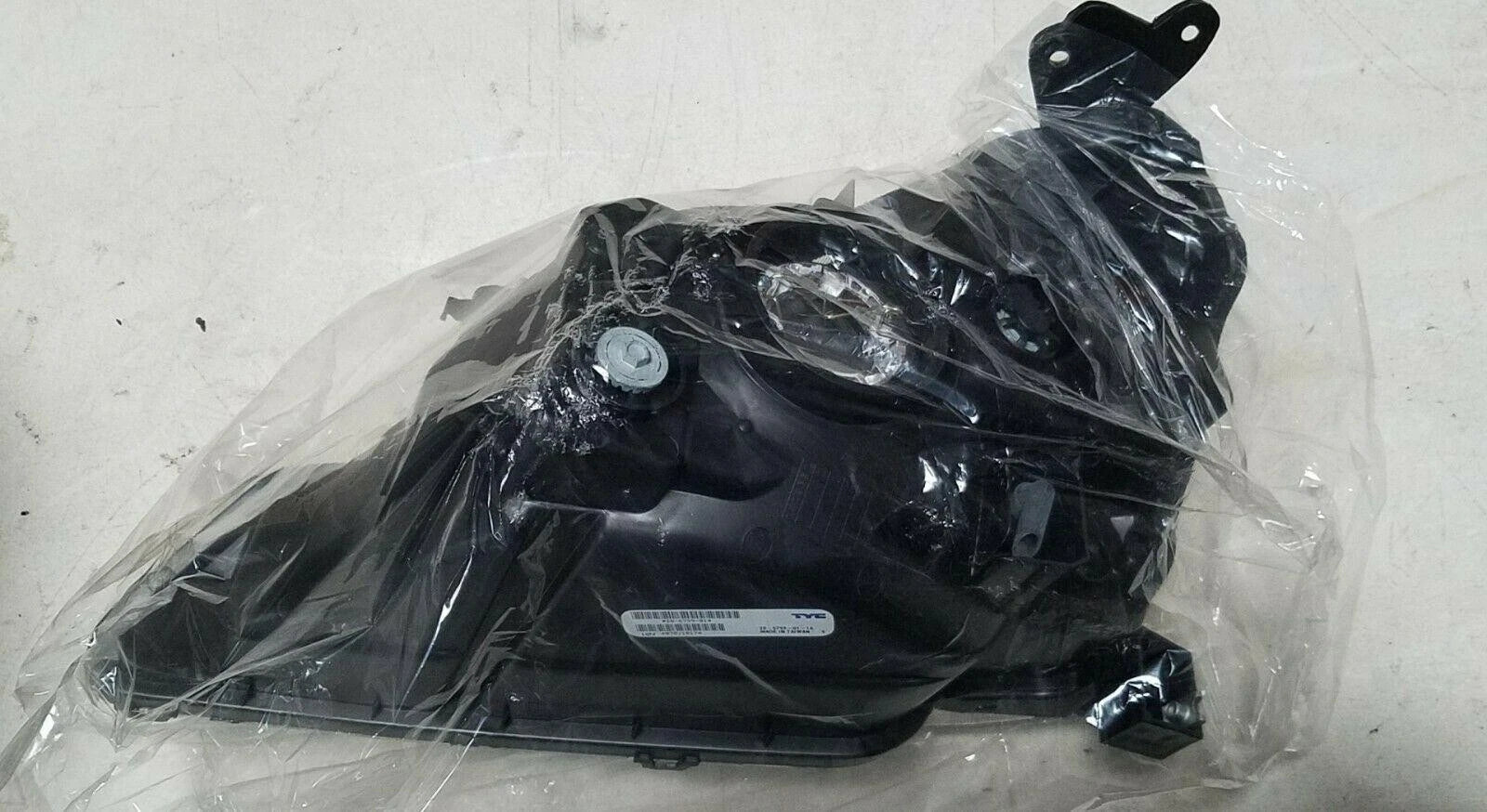 Passenger Side Headlight for Suzuki Aerio (2002–2007) TYC 20-6799-01