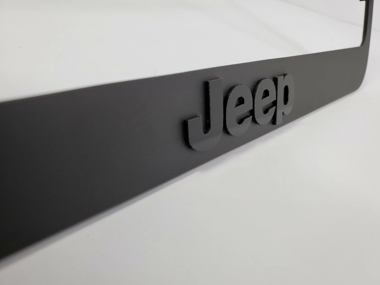 Matte Black Premium License Plate Frame with Script Emblem for Jeep (2007–2025)