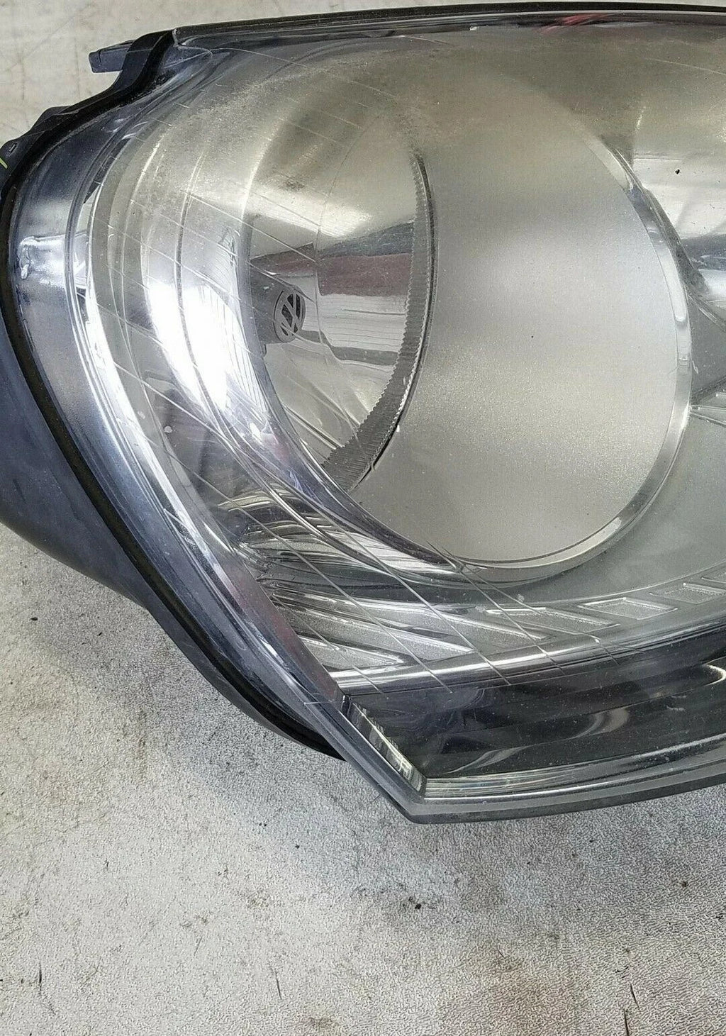 Halogen Headlamp for Volkswagen Jetta Rabbit (2005) OEM Hella 1K6941006S
