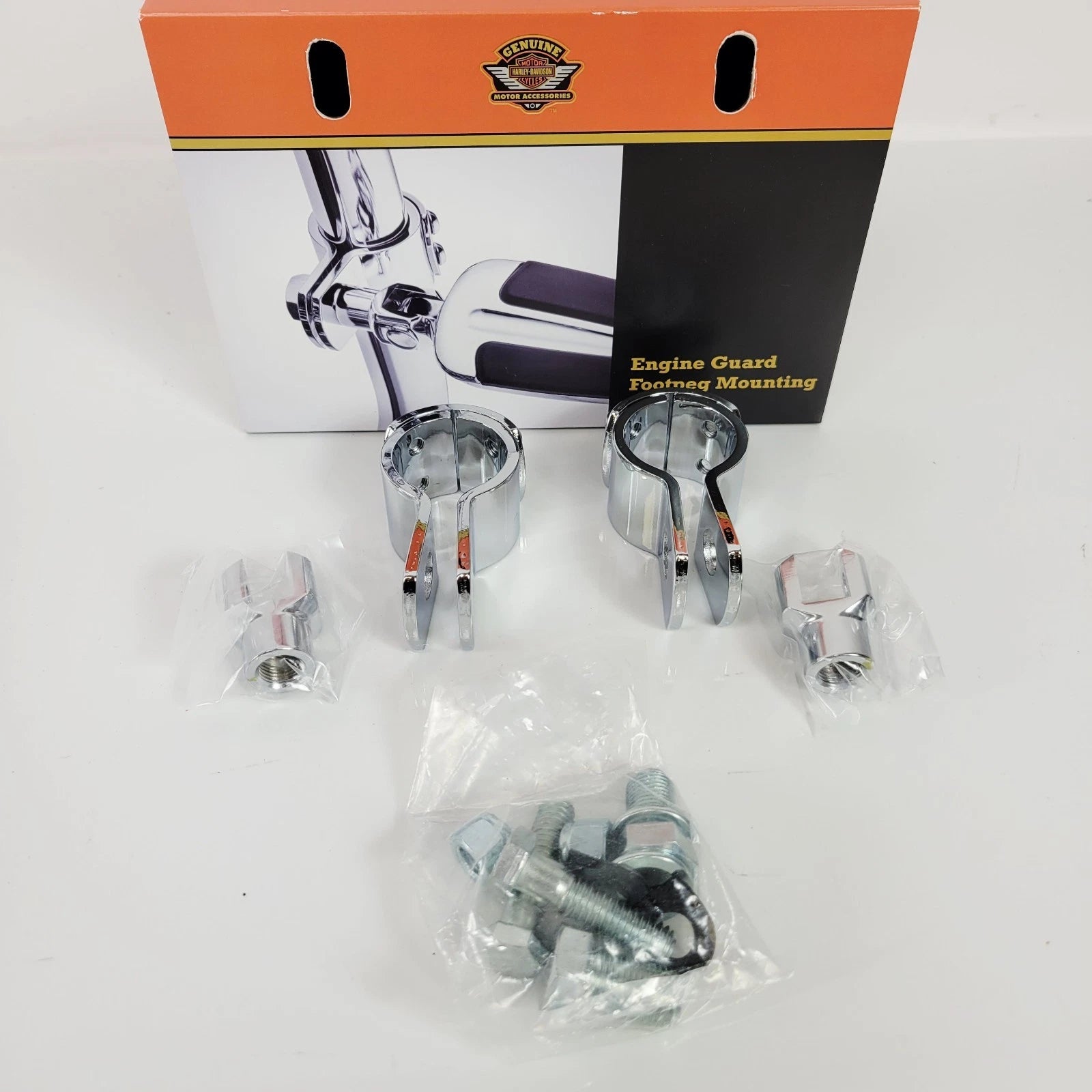 Pair of Chrome Guard Footpeg Mounts for Harley-Davidson (1998–Present) 50964-98