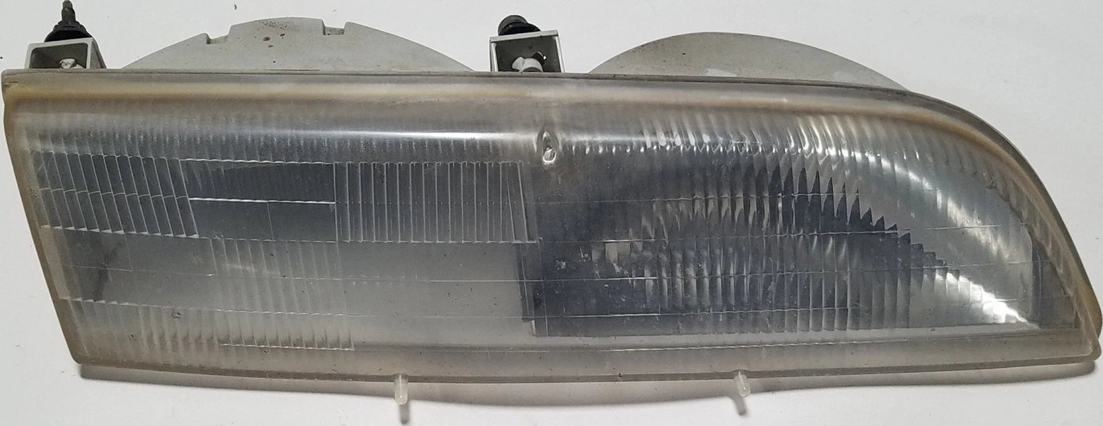 Headlight for Ford Thunderbird (1989–1993) Passenger Side Grade B